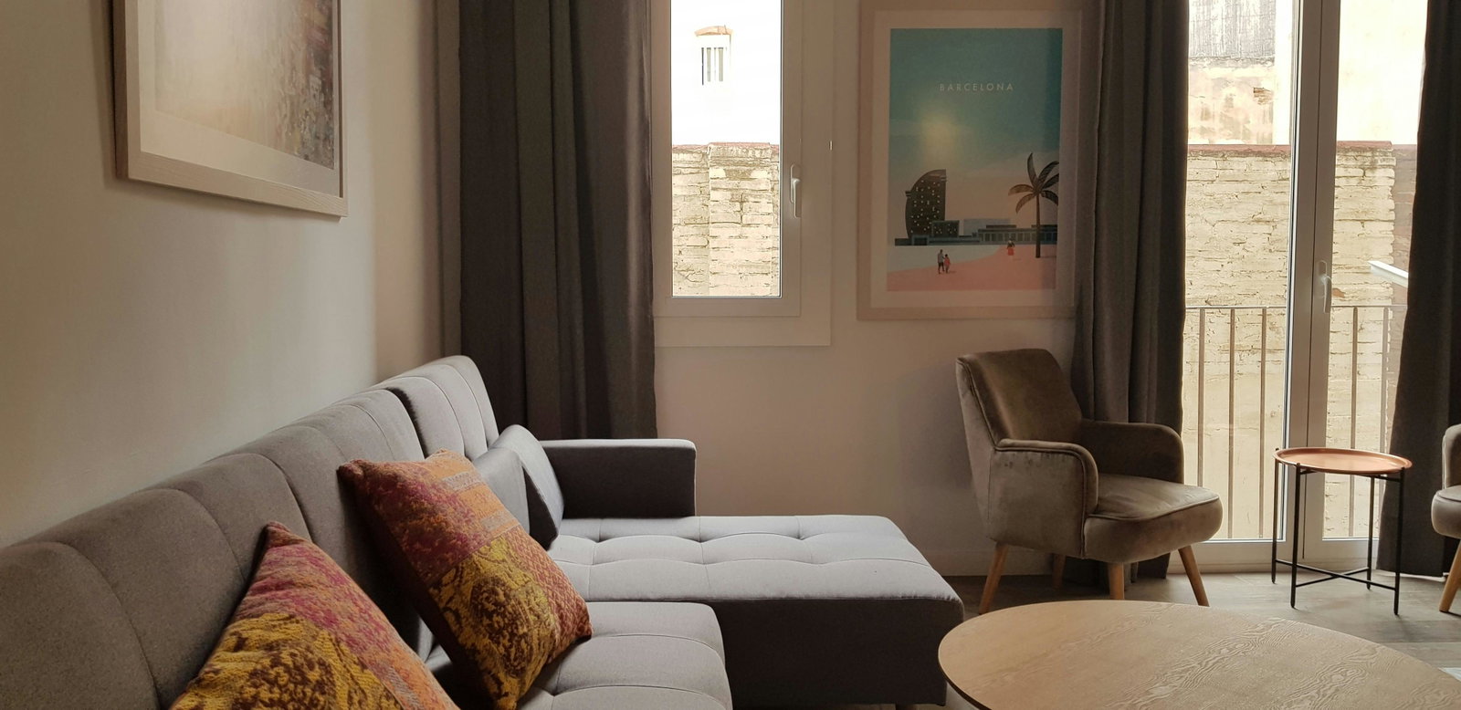Natural light floods the space. The apartment faces the building’s inner side.