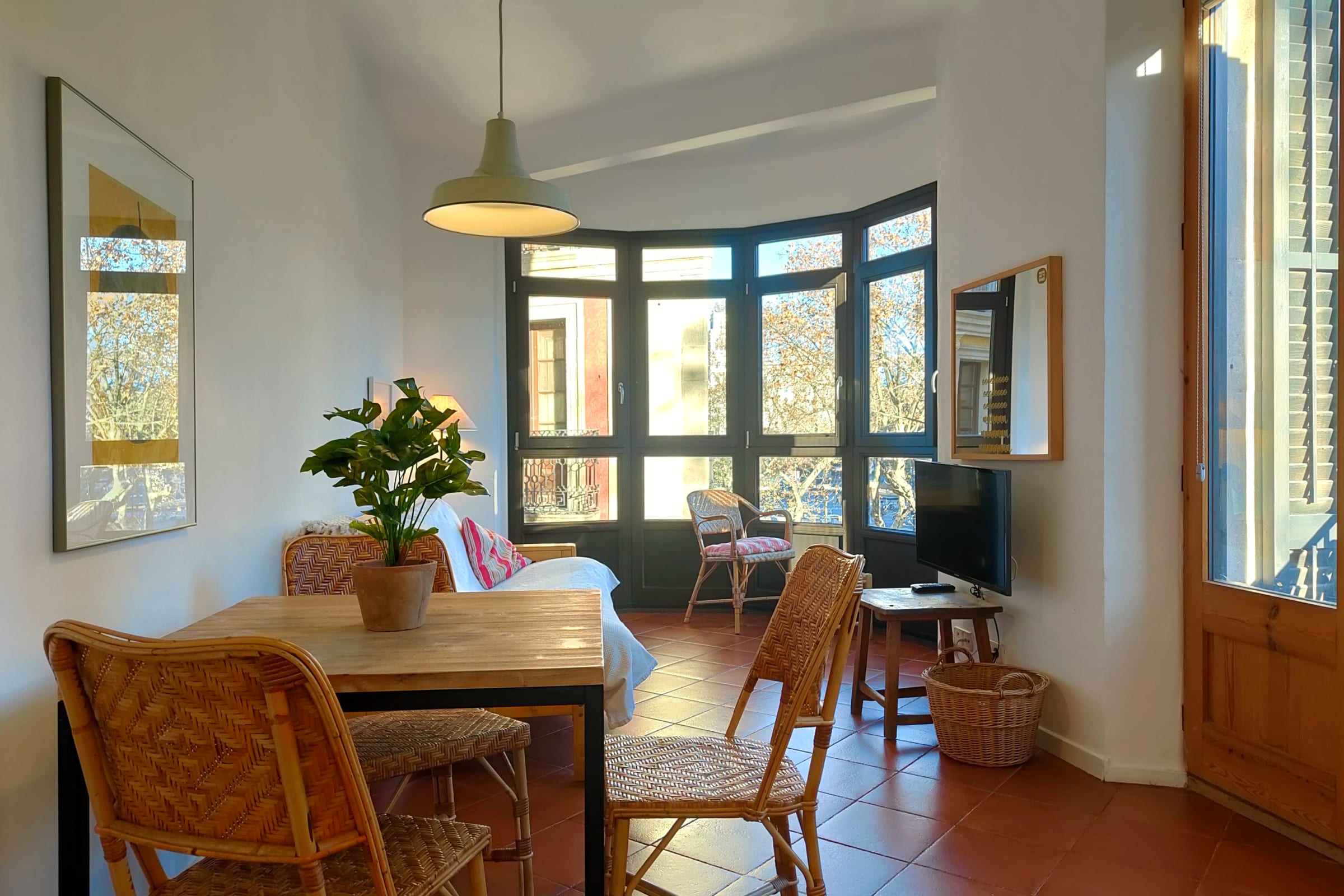 Open dining area connected to the kitchen, with a charming nook for reading.