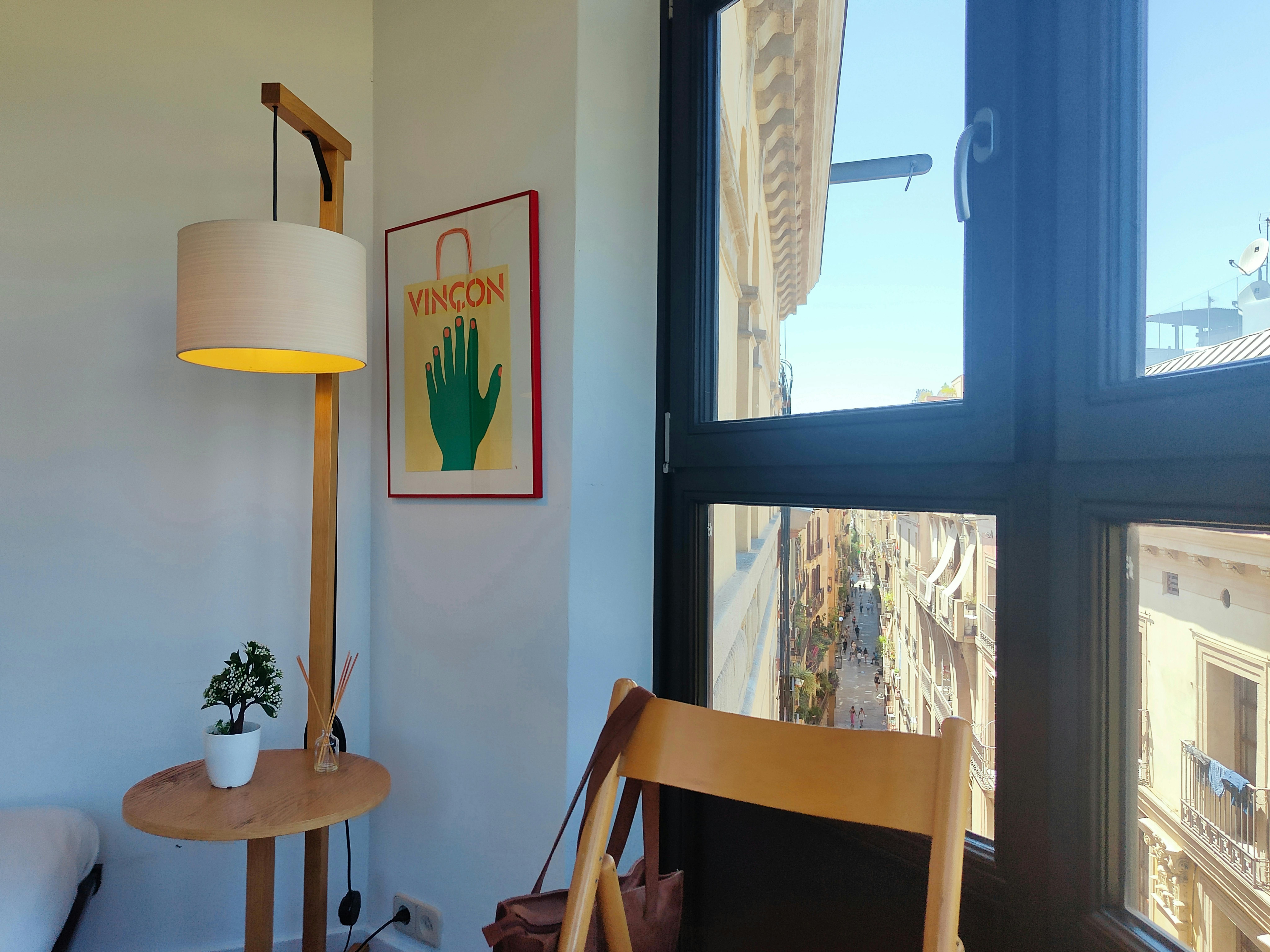 Enjoy a moment of peace and observe the daily life of Barcelona from the comfort of your stylishly furnished living space.