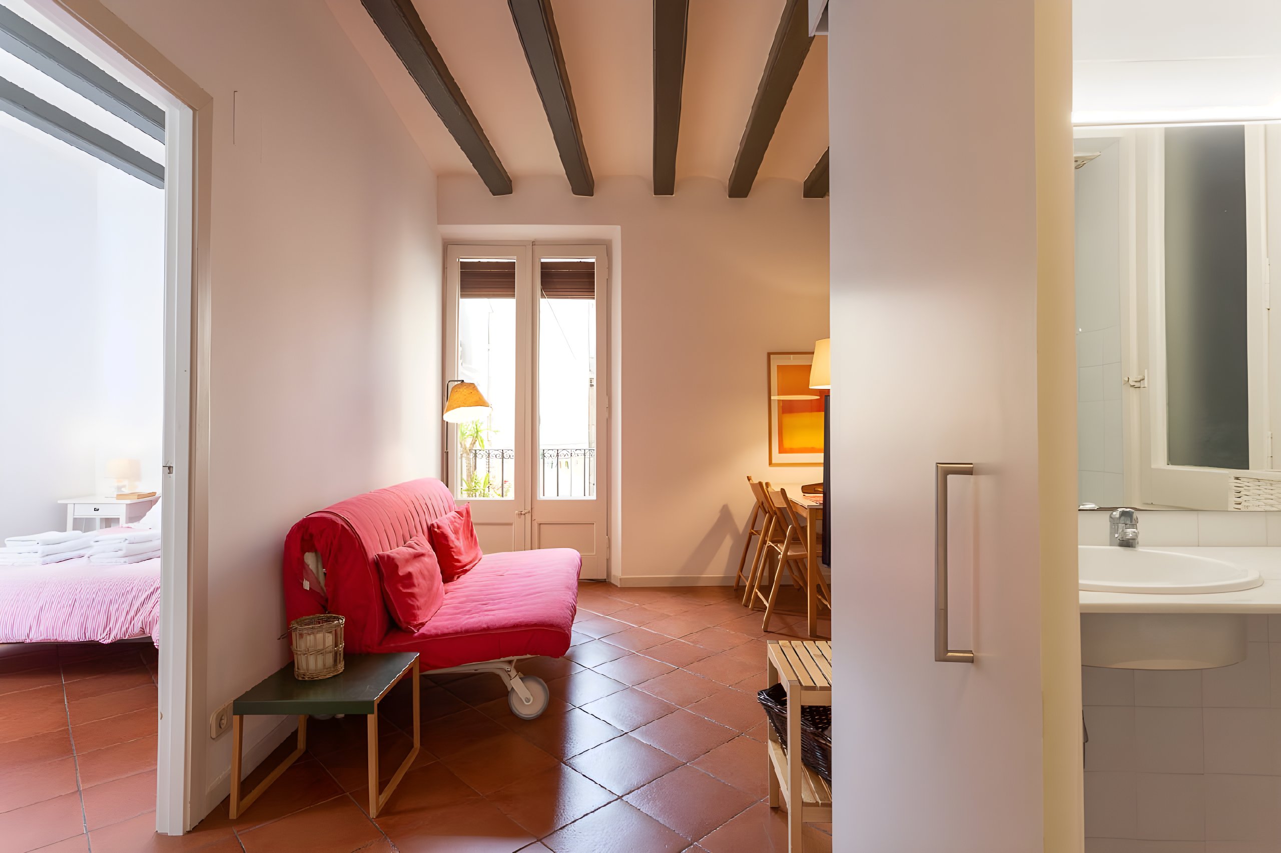 From the entrance you will find the bathroom at your right and the double bedroom at your left.