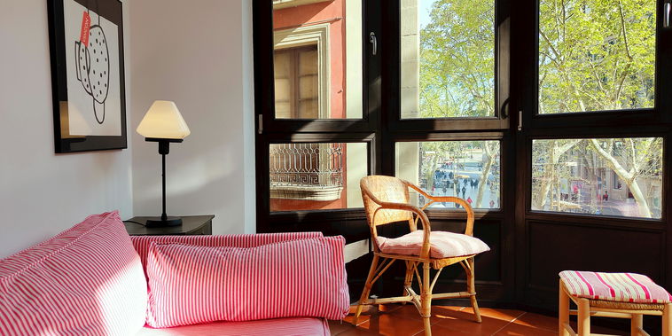 Cozy reading nook in the living room, perfect for relaxing.