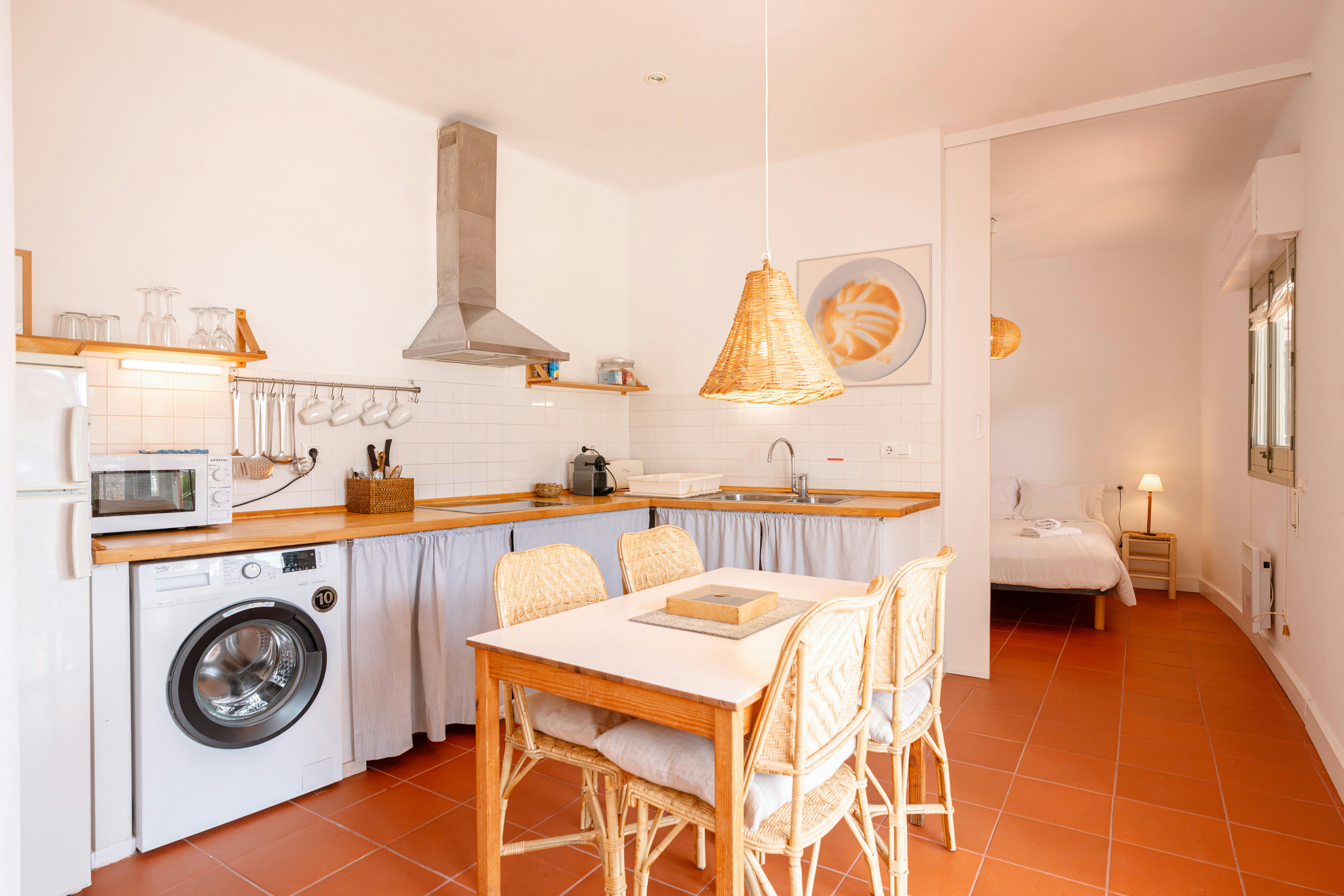 Feel at home with this modern open layout and practical kitchen setup.