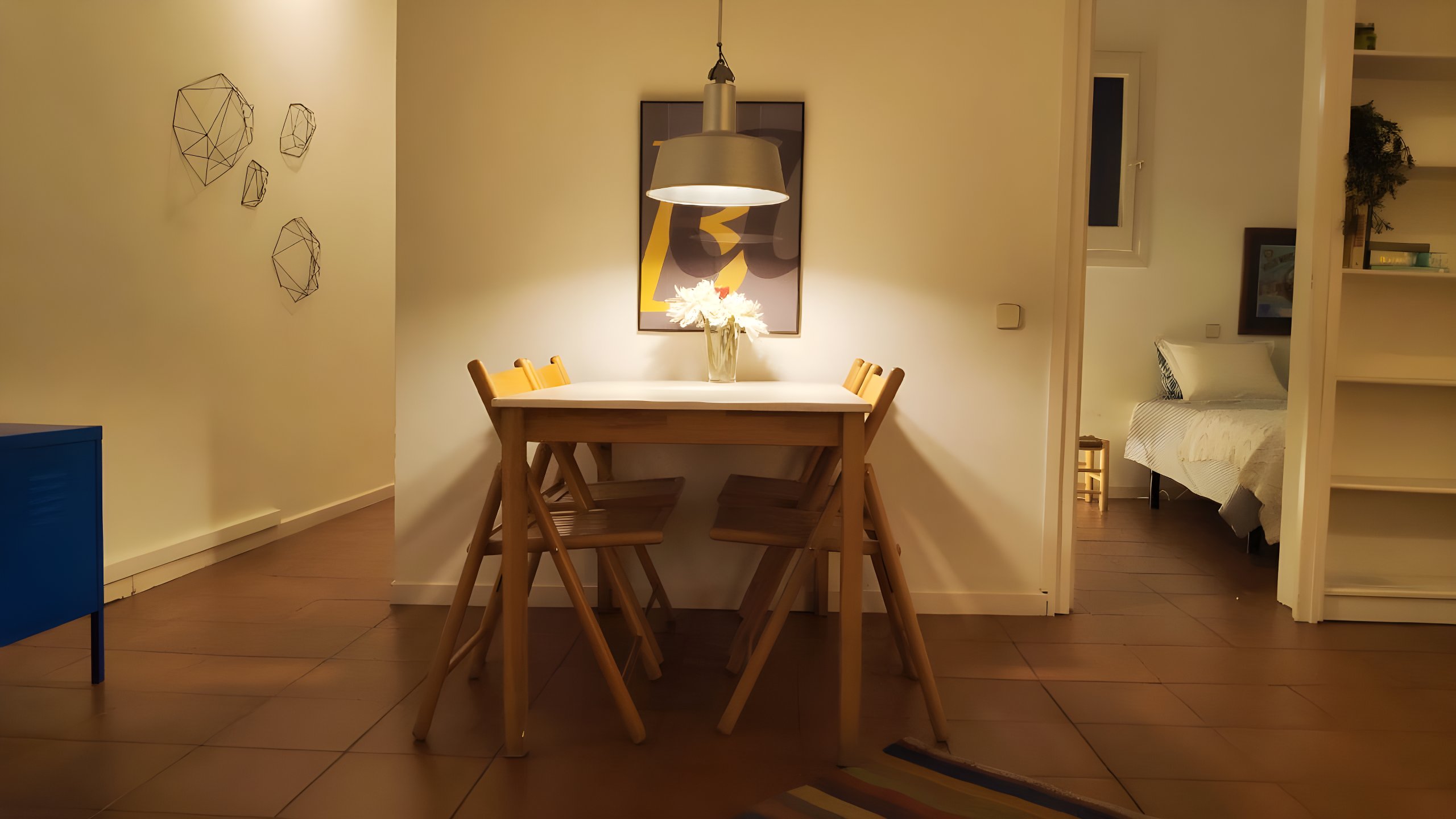 Dining and living areas fully integrated in an open layout.