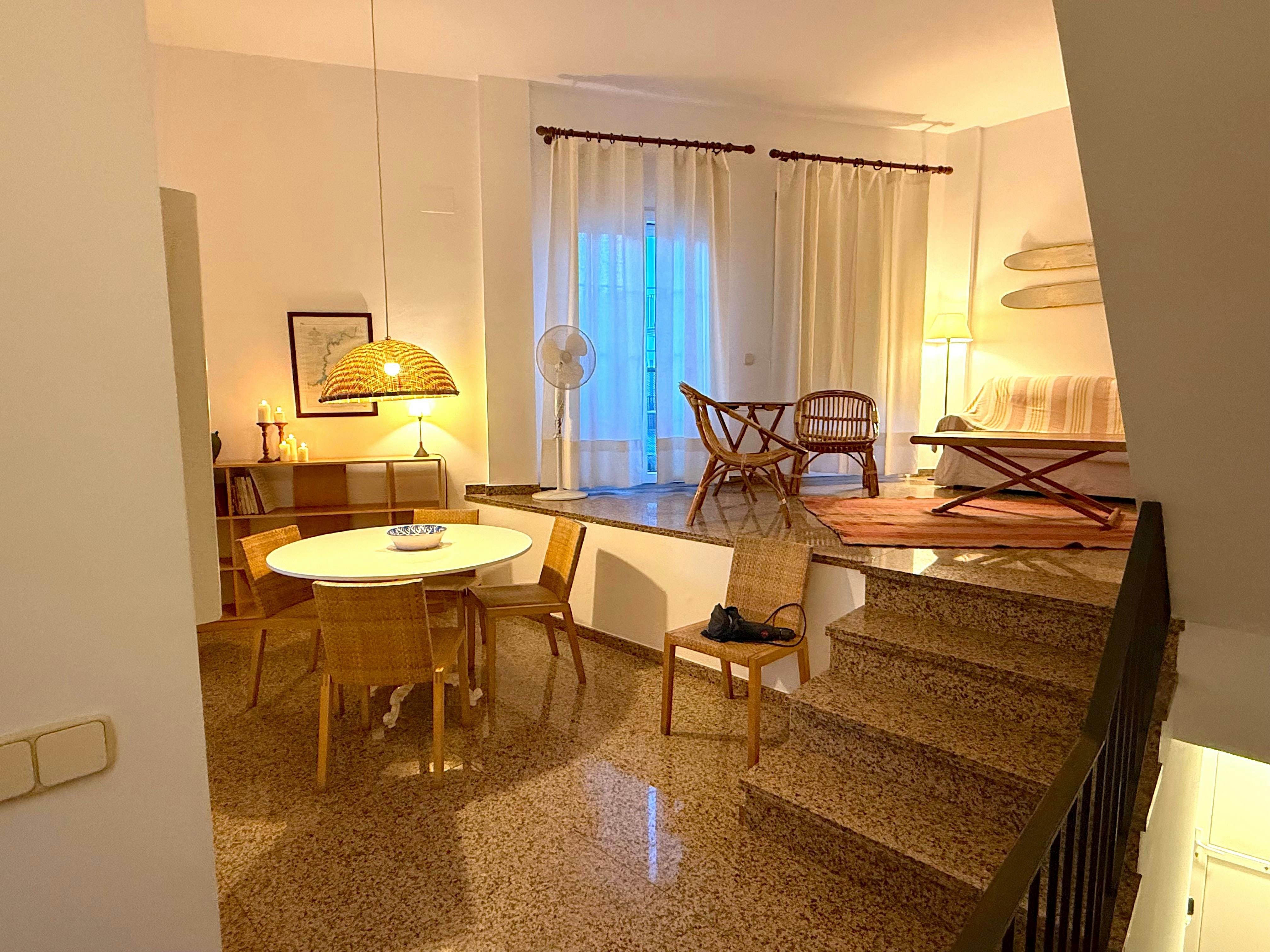 Bright and comfortable interior with a unique split-level layout, ideal for relaxing after a day in Tamariu.