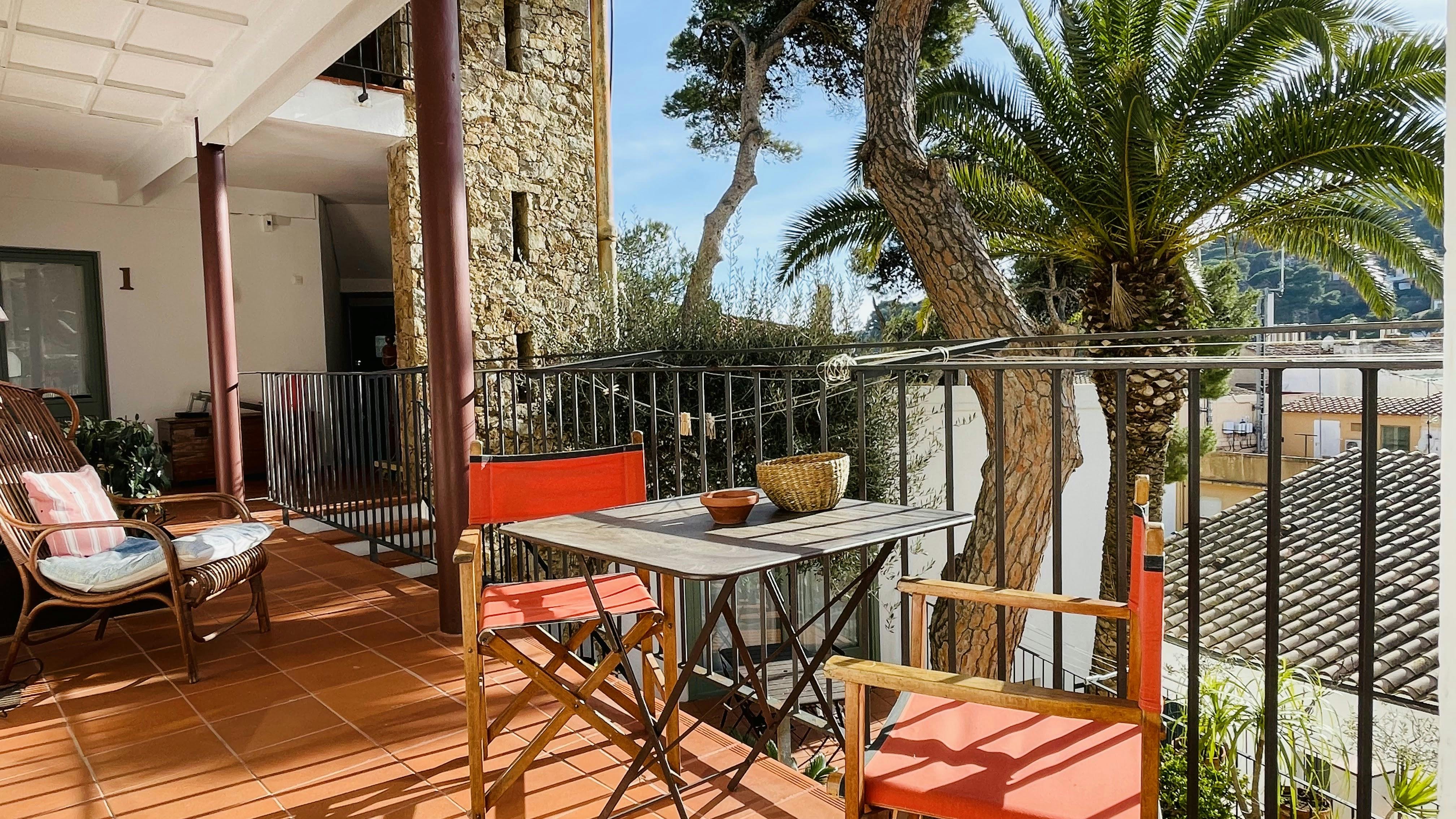 Enjoy a relaxing chat on the balcony with an aperitive in hand, feeling the Mediterranean breeze as you unwind.