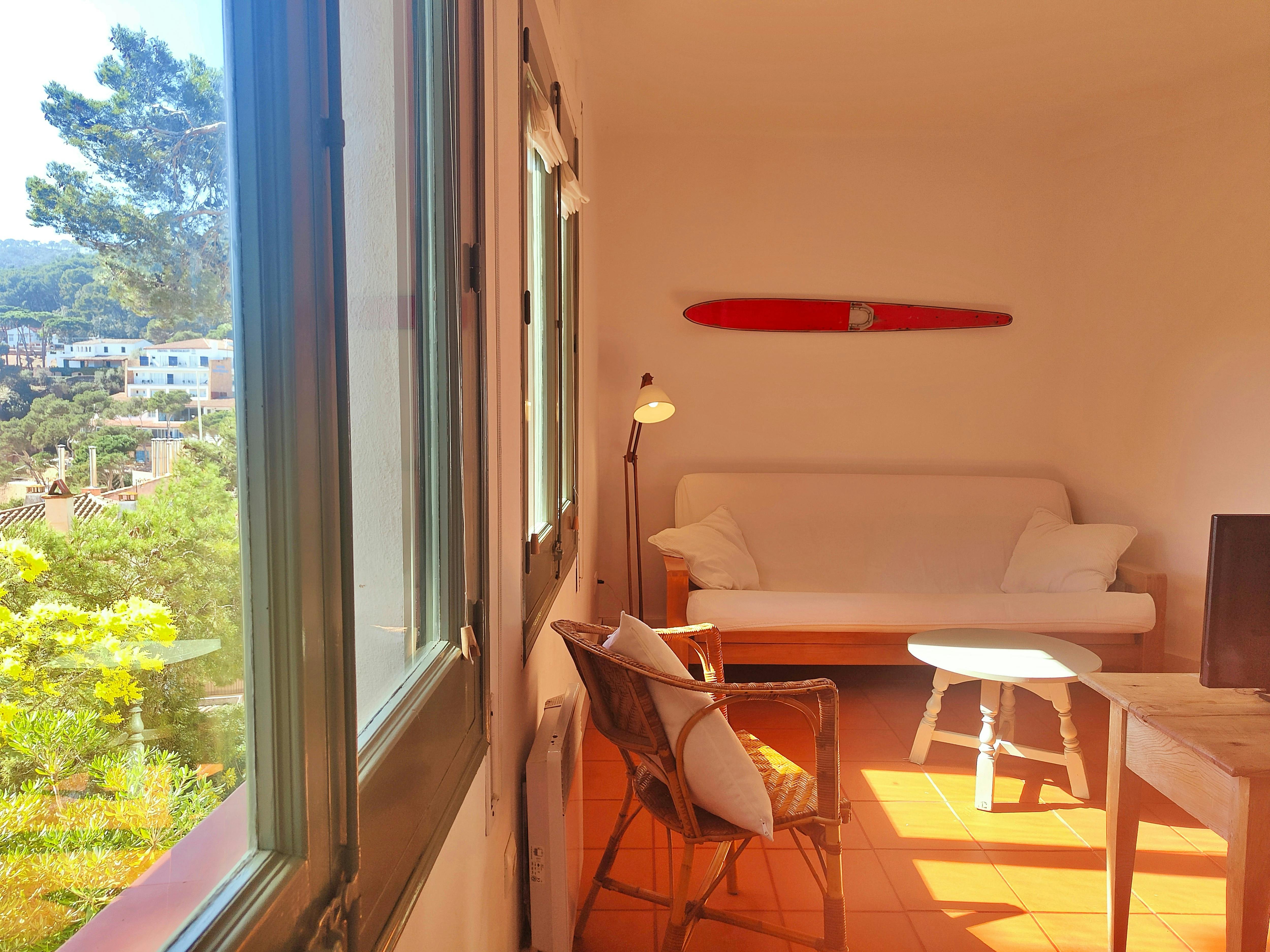 Luminous and spacious living room. There is a sofa bed suitable for two children or teenagers.