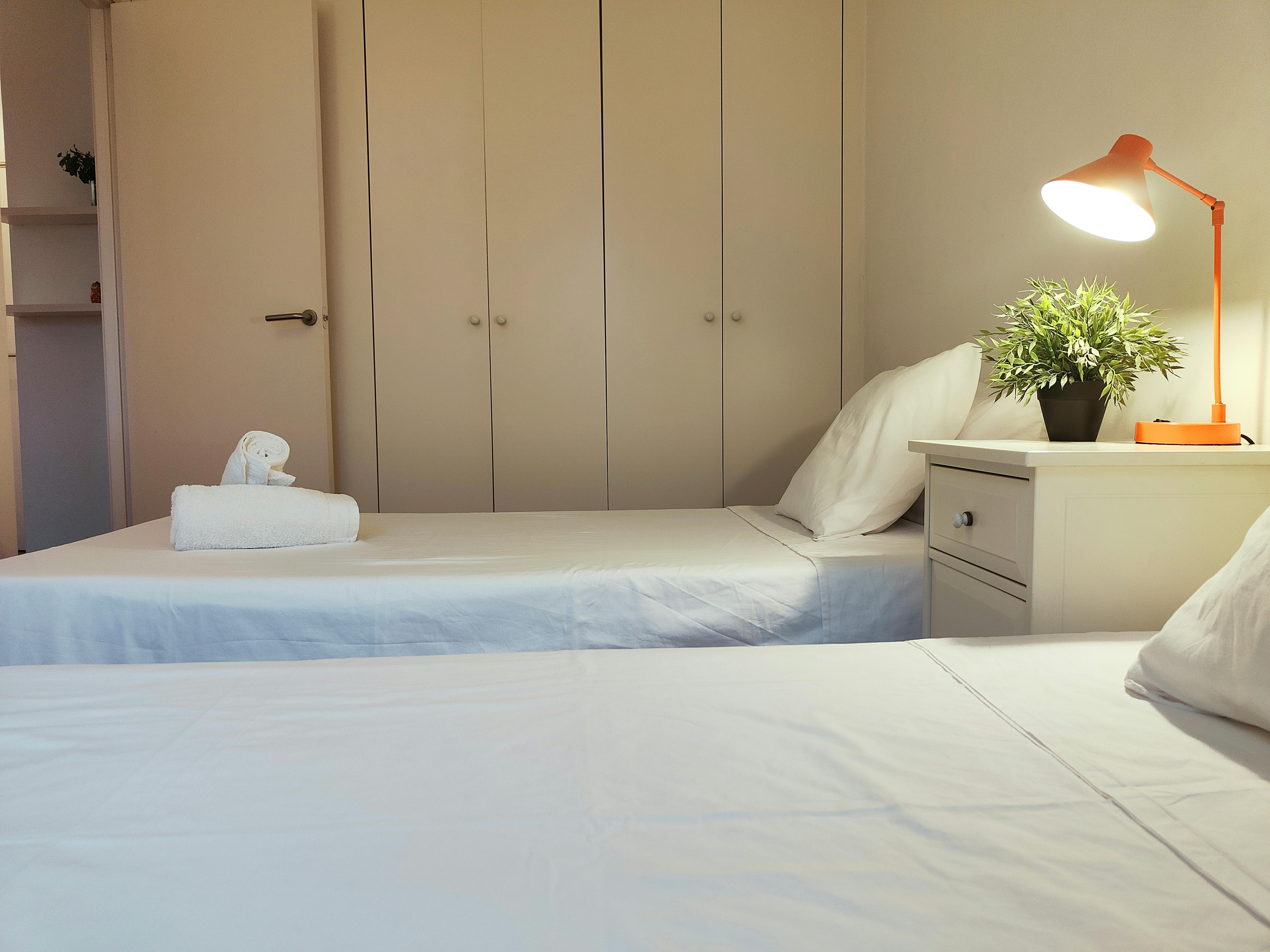 Comfortable twin bedroom apartment with generous storage in the wardrobe.