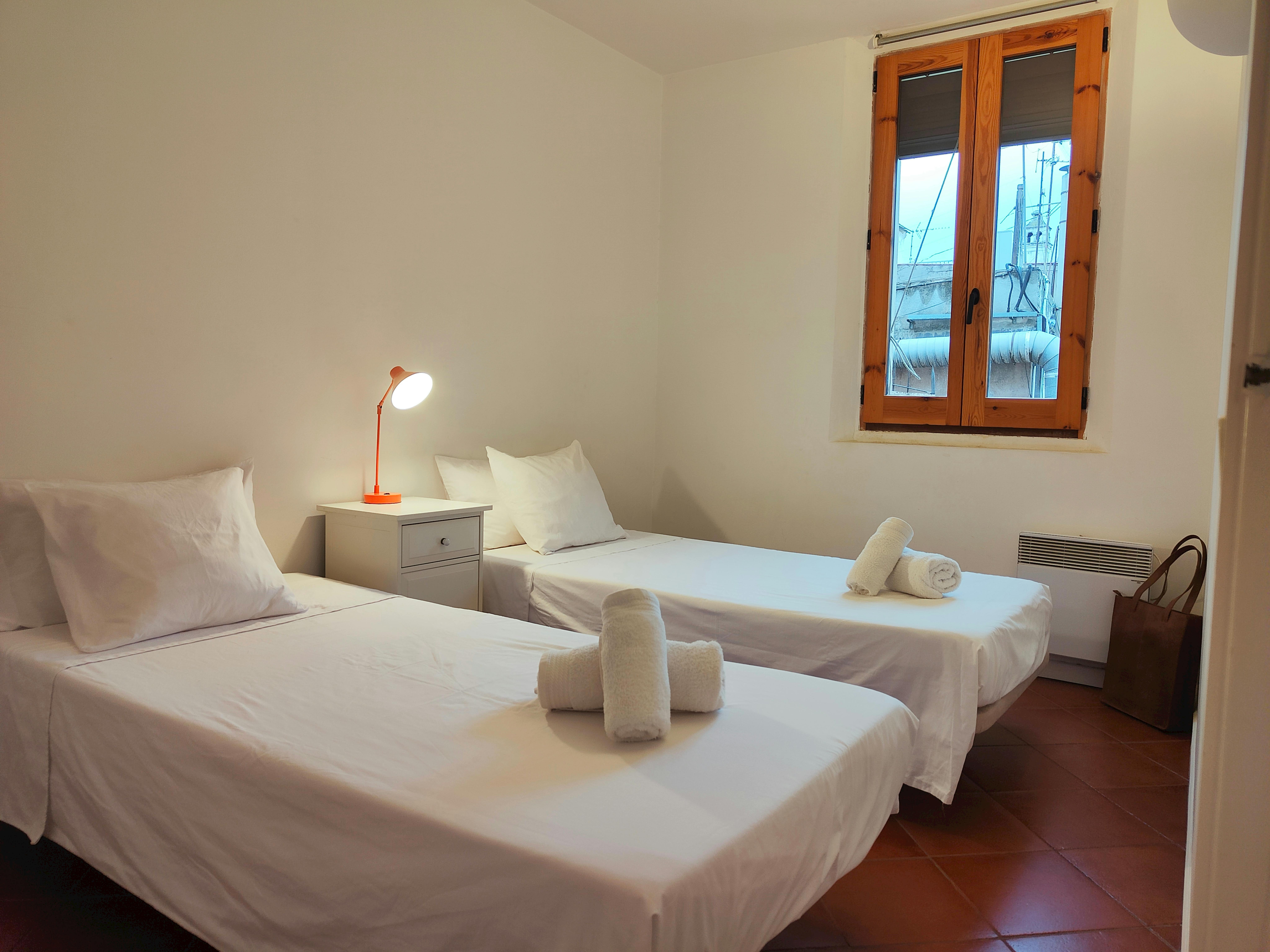 Rest easy in a quiet 4th-floor apartment overlooking the interior courtyard.