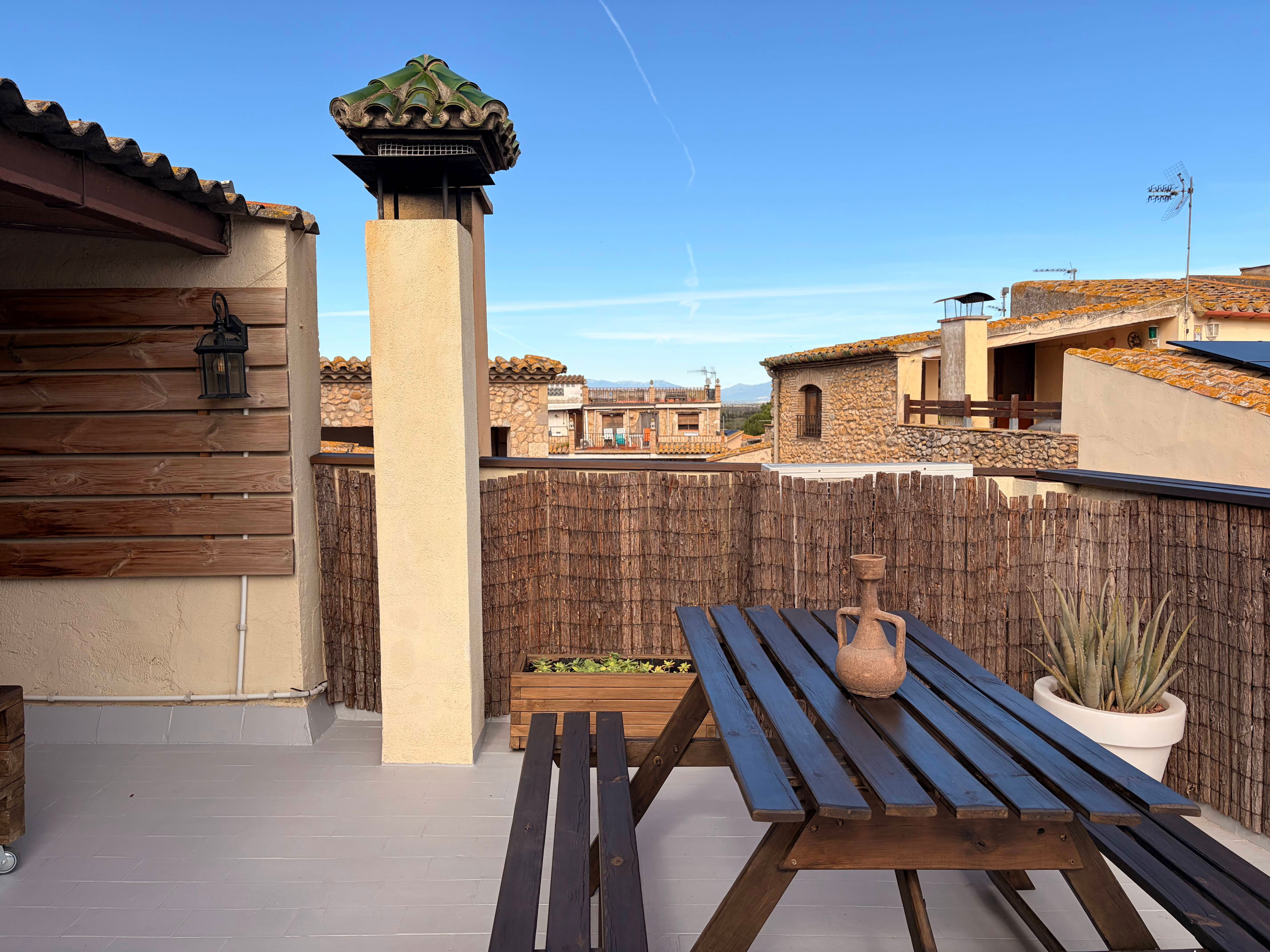 Enjoy your breakfast in this cozy and rustic dining area, highlighted by a roaring fireplace and warm terracotta floors.