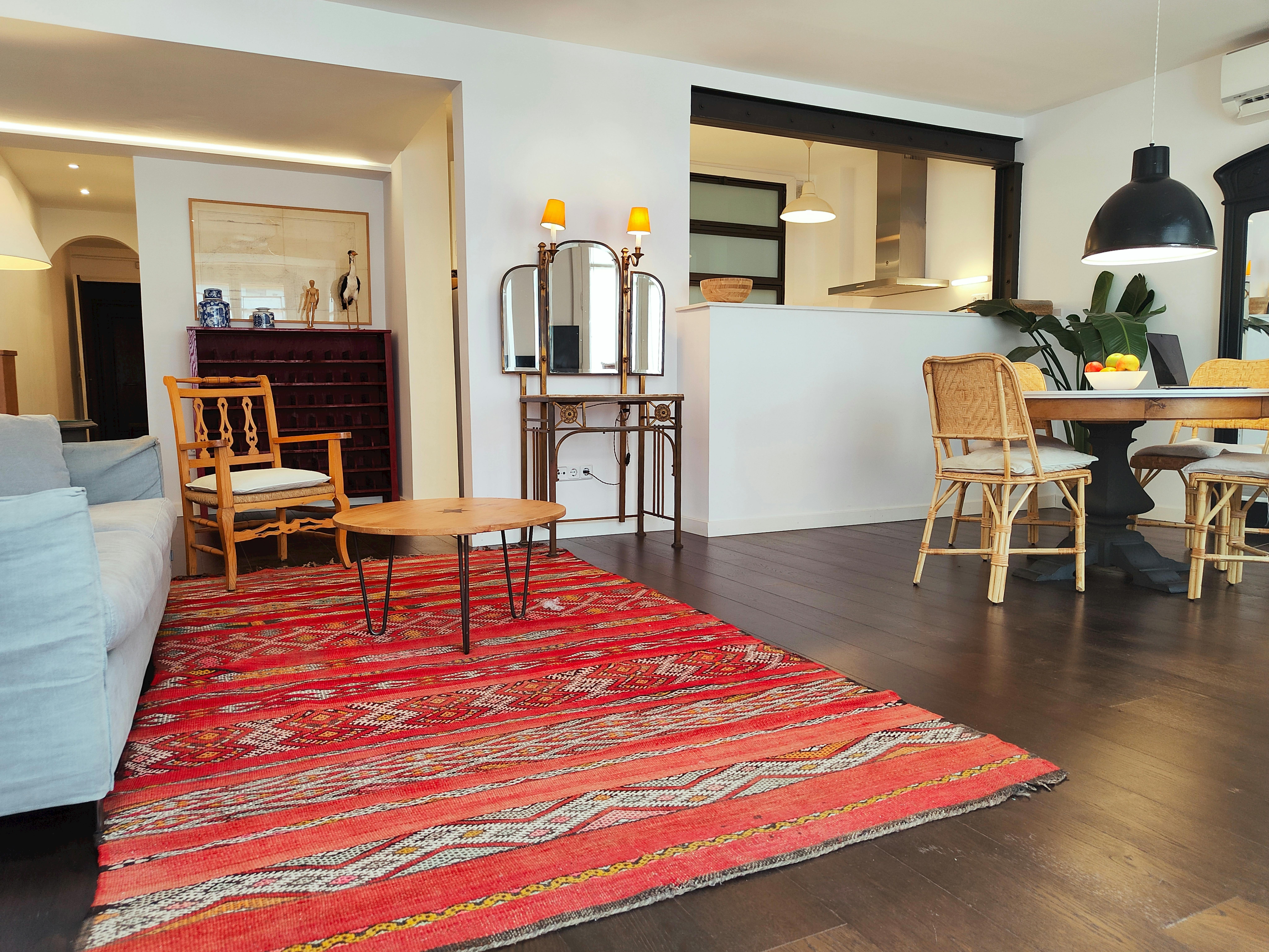 Open and luminous living room with comfortable sofa and stylish concept.