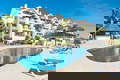 Apartamento con piscinas sauna jacuzzi y vistas panorámicas