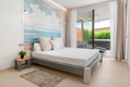 Elegante apartamento de 2 dormitorios con jardín privado y jacuzzi en Higuerón