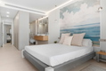 Elegante apartamento de 2 dormitorios con jardín privado y jacuzzi en Higuerón