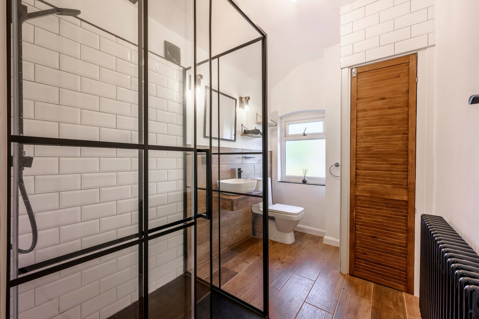 Newly renovated upstairs shower room with a large walk-in rainfall shower. With a second bathroom downstairs, there are no morning queues, even with six guests in the house.