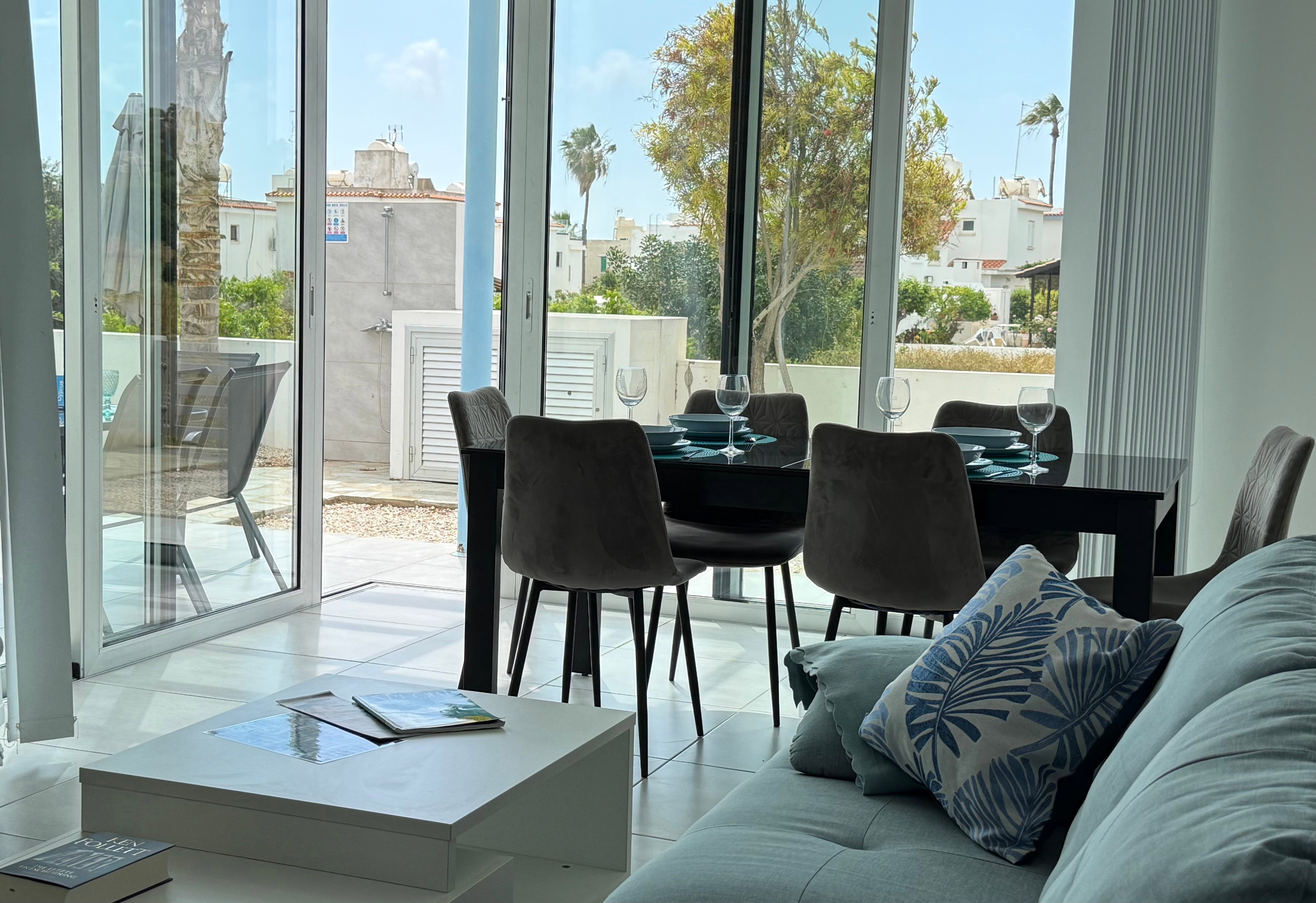 Living room and inside dining area open directly to outside dining area
