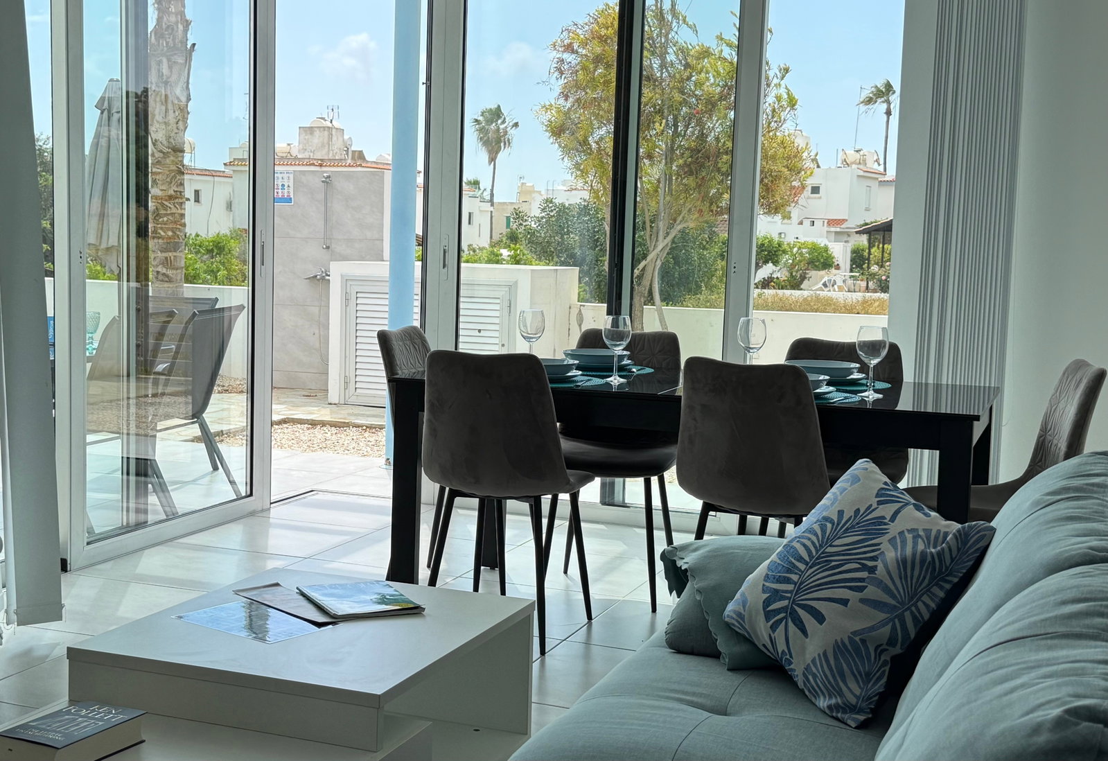 Living room and inside dining area open directly to outside dining area