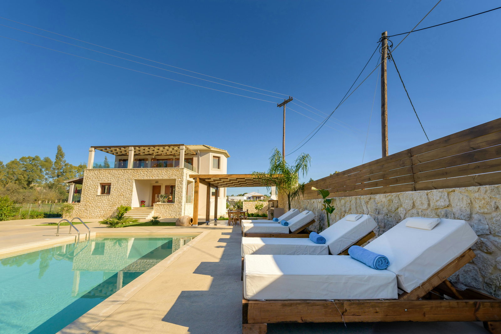 Comfortable Sun Loungers: Enjoy sunbathing or unwinding in complete privacy by the pool.