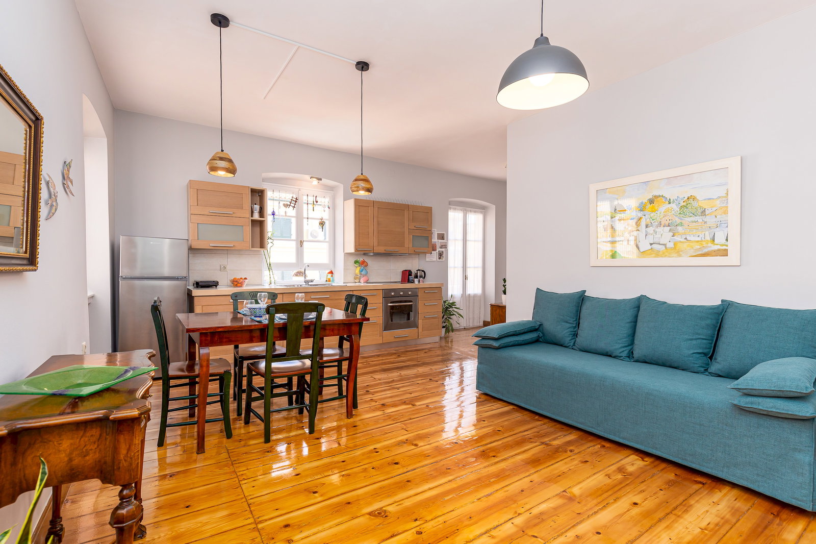 Relaxing atmosphere in the cozy living area. Plenty of natural light!