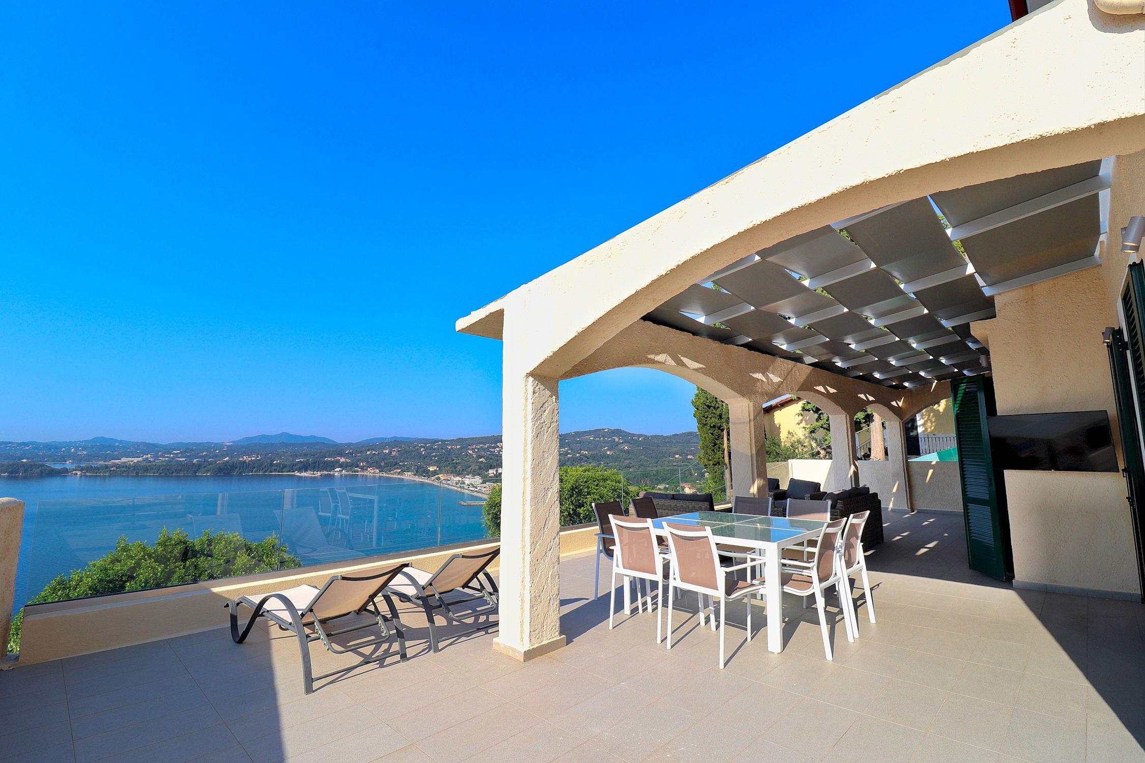 Plenty of outdoor space for your group in the upper level with large flat screen TV