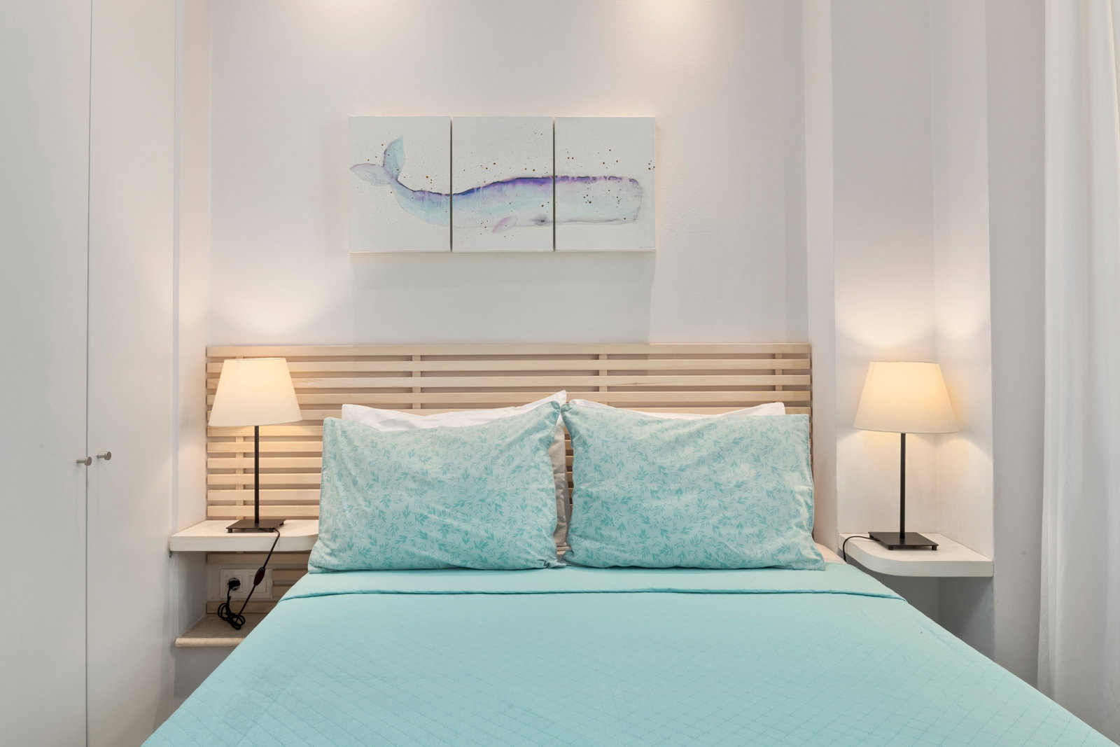 "Indulge in a peaceful night's sleep in our inviting double bed."