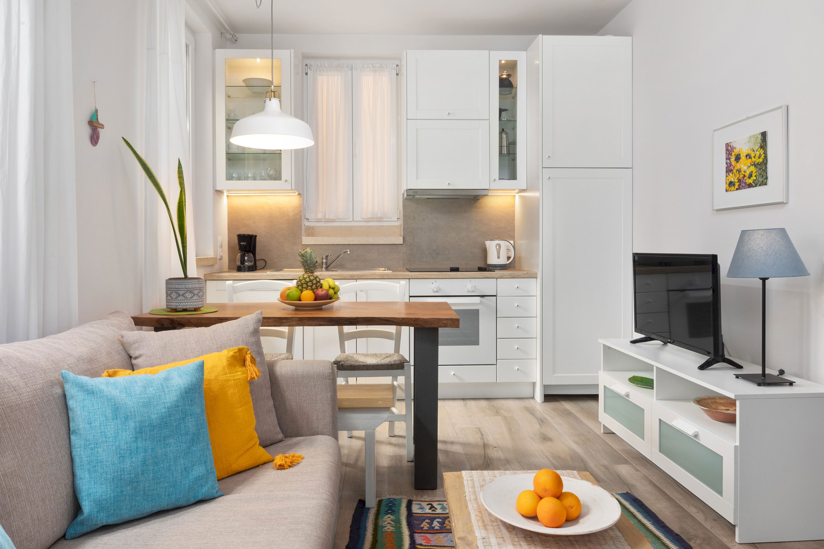 "Experience the essence of Greek hospitality in our thoughtfully designed studio."