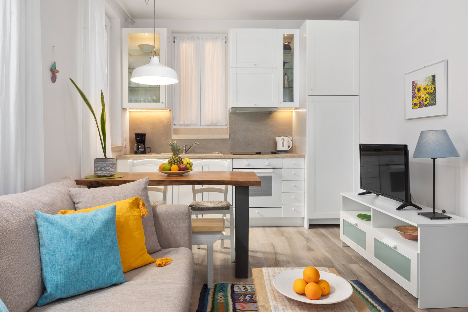 "Experience the essence of Greek hospitality in our thoughtfully designed studio."