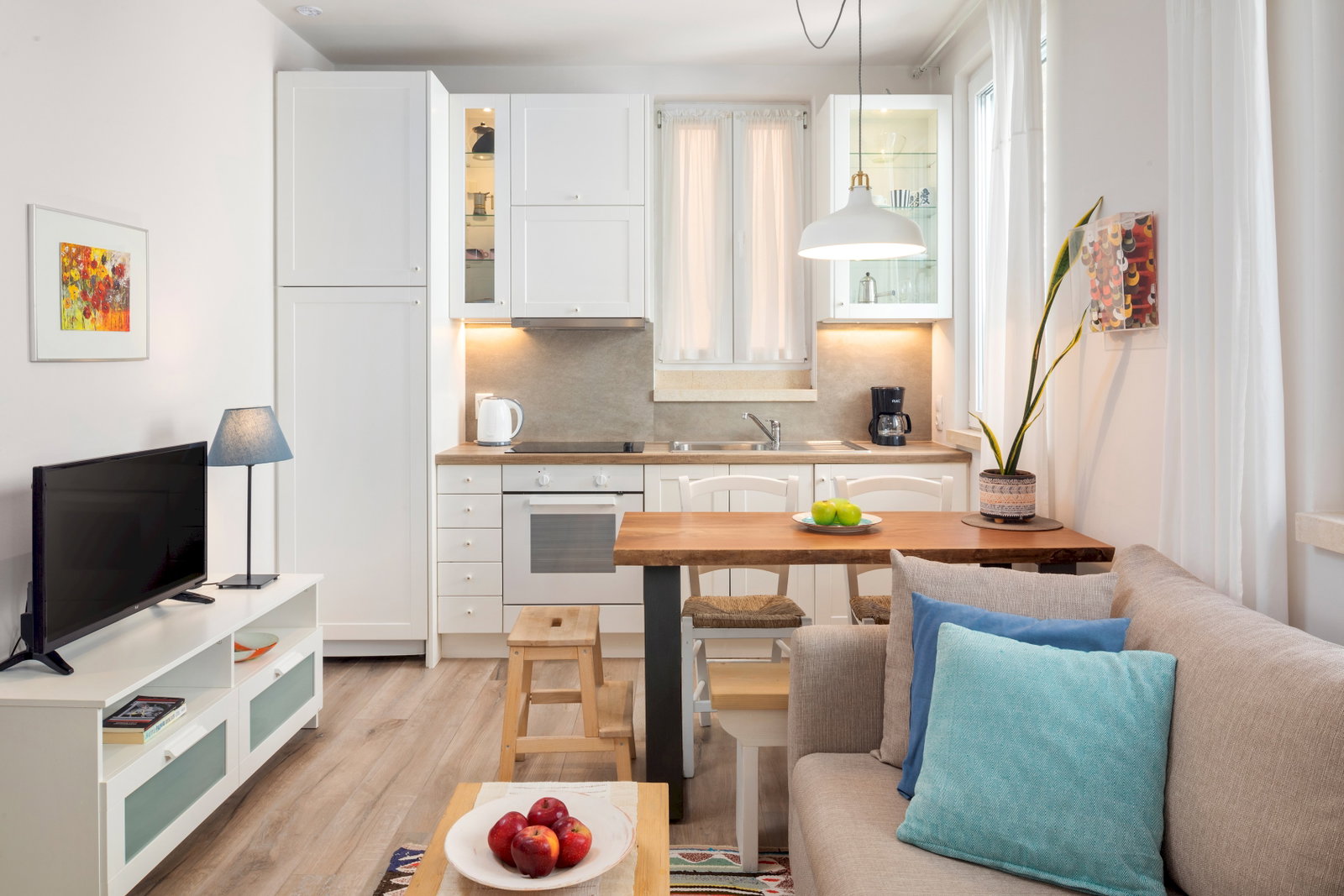 "Experience the essence of Greek hospitality in our thoughtfully designed studio."