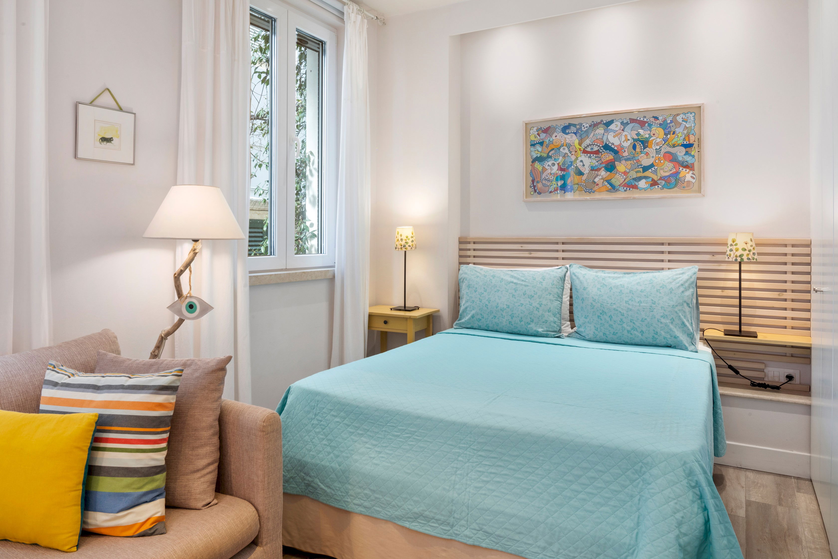 "Indulge in a peaceful night's sleep in our inviting double bed."