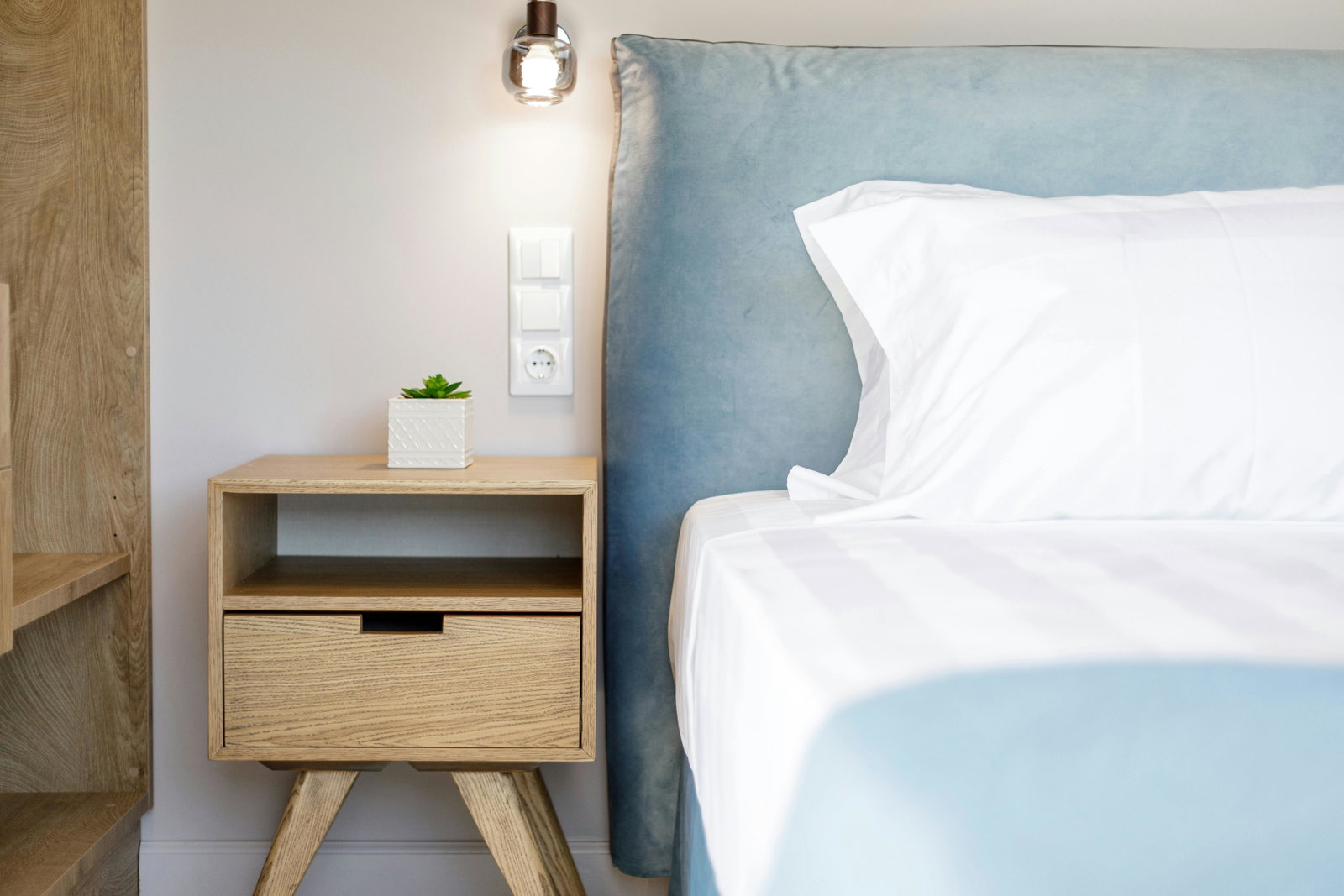 "Relax and unwind in the comfort of our Sea View Suite, featuring a sophisticated interior, a private balcony with mesmerizing views, and thoughtfully curated details for an unforgettable stay."
