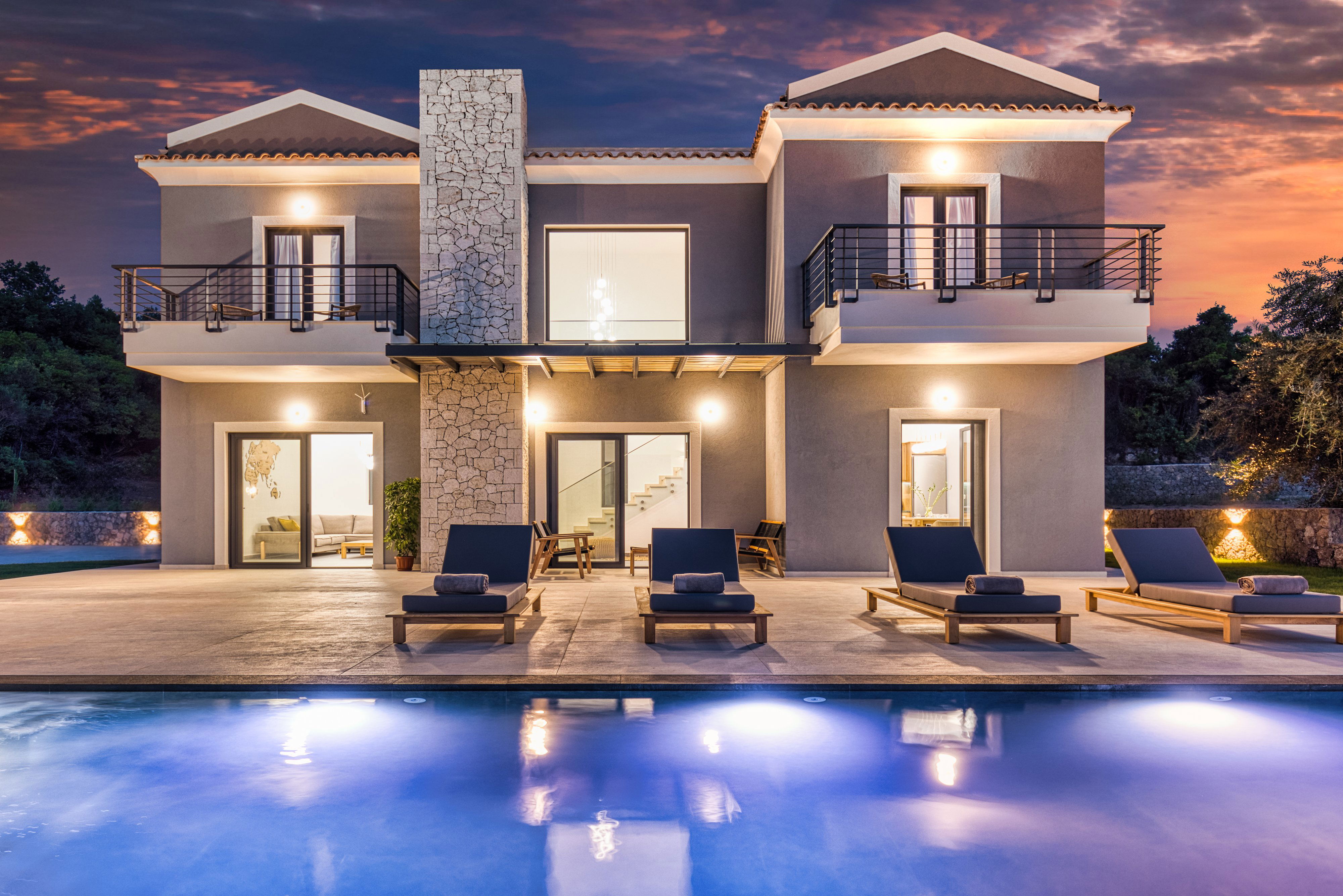 "Experience breathtaking sunsets by the illuminated infinity pool."