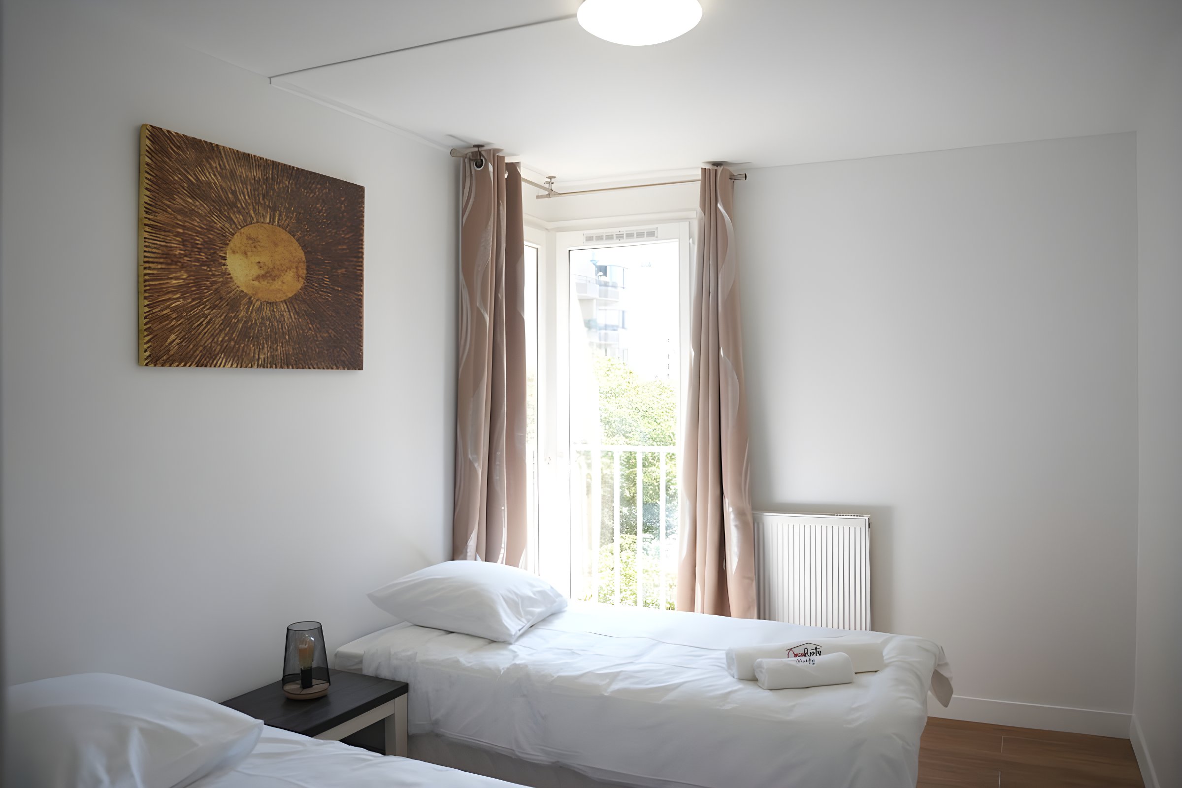 Bedroom equipped with two separate beds, offering ample space and brightness. Large built-in closet for optimal storage. #Bright Room #EspaceOptimal #ComfortModern