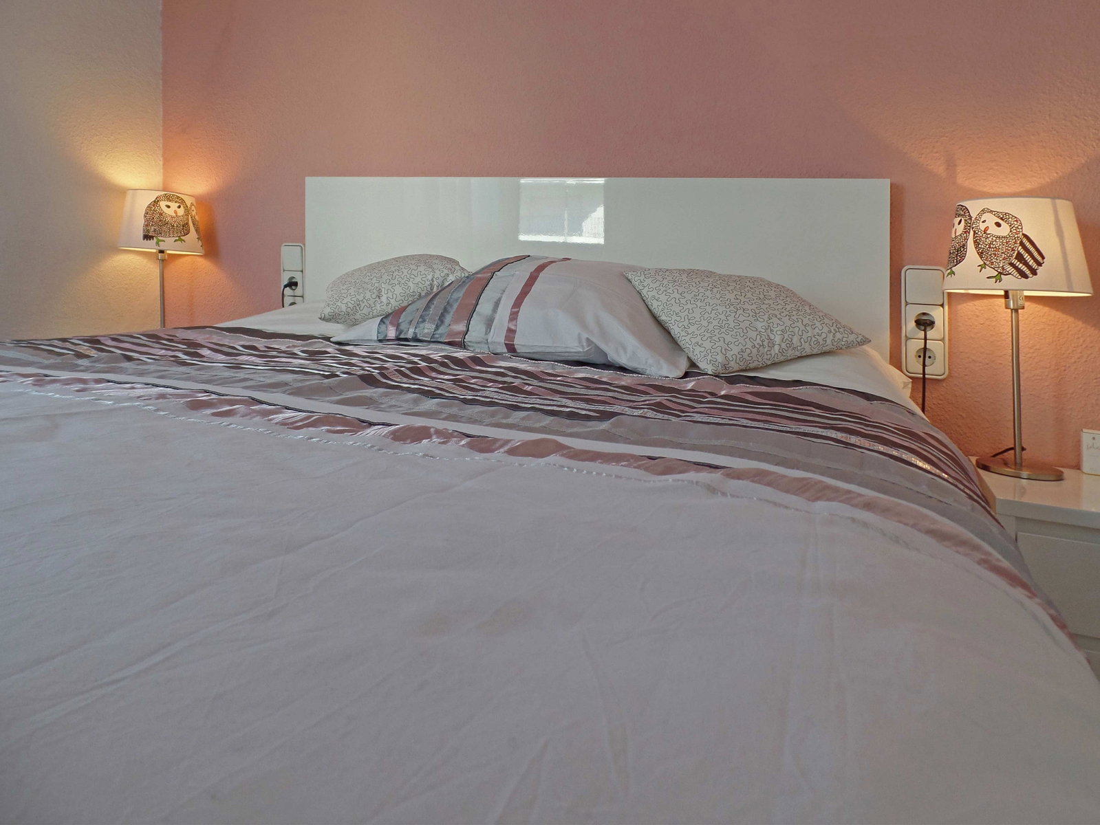 King size bed in the first bedroom.