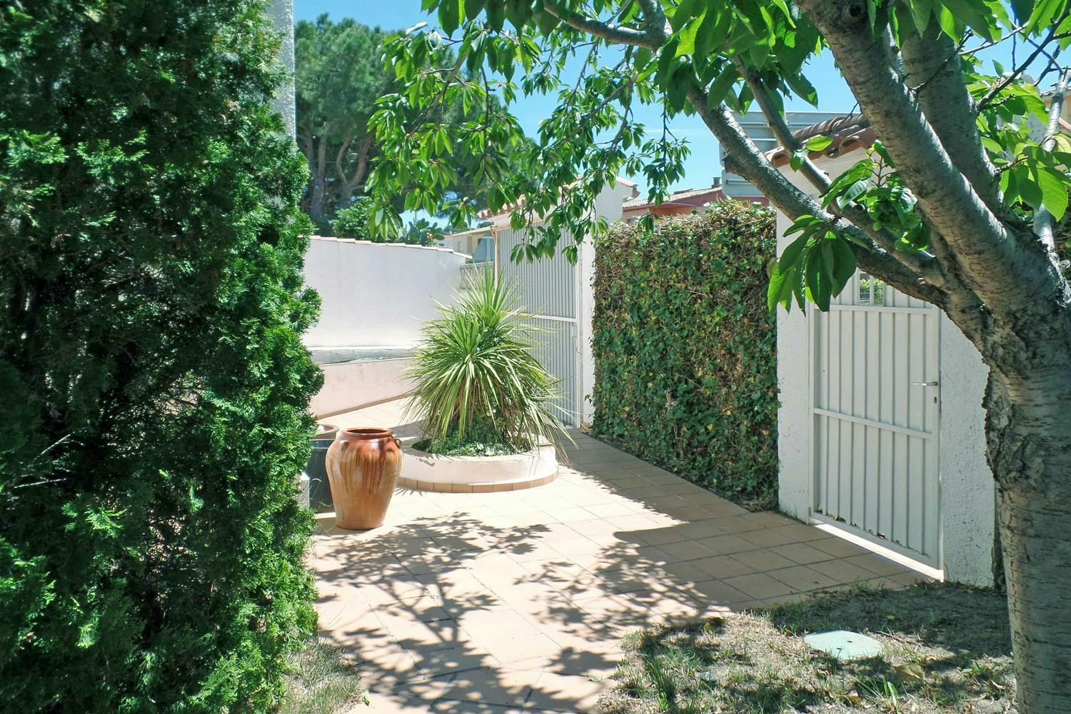 The front of the terrain with a parking spot.
