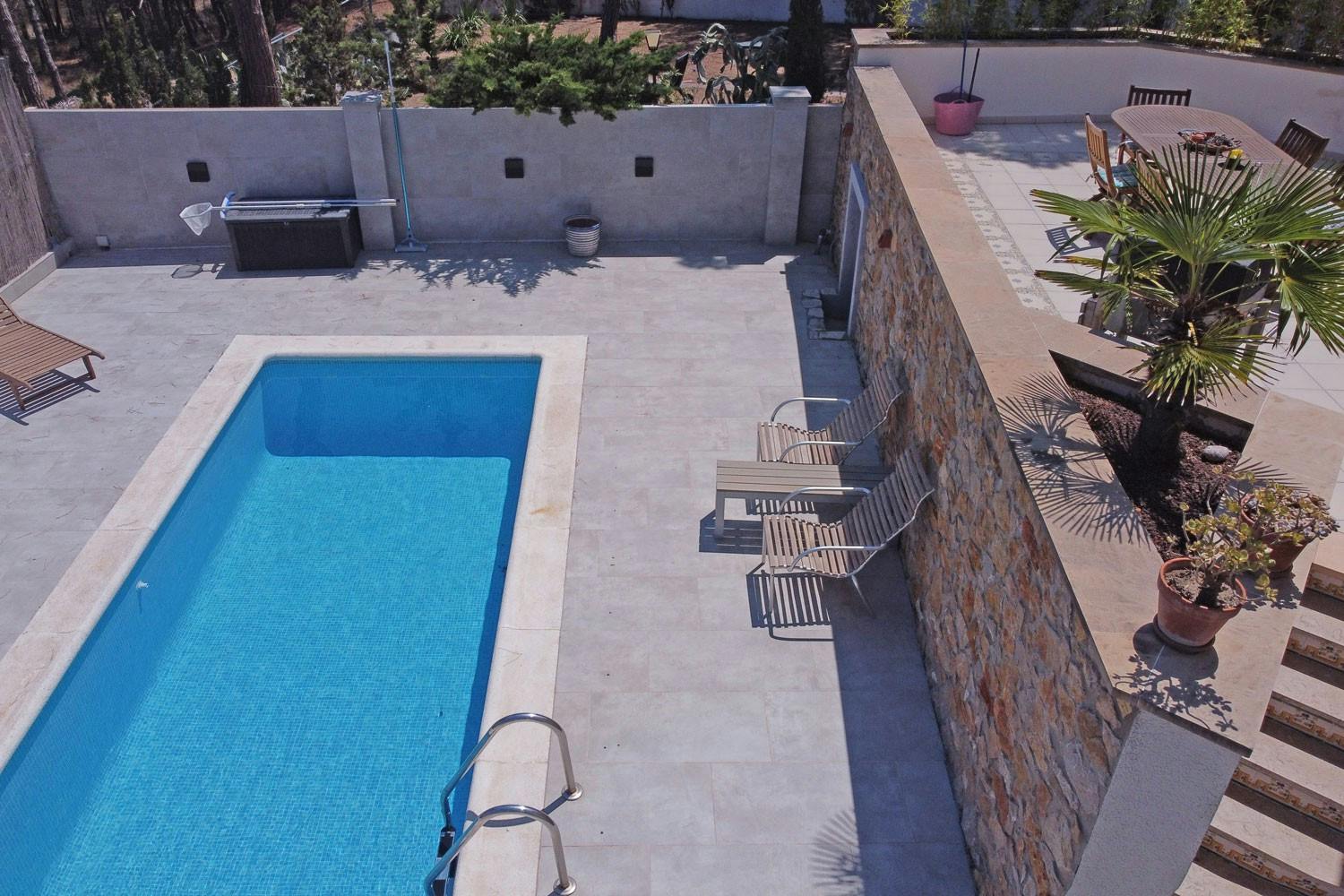 As you can see is the swimming pool close to the terrace.