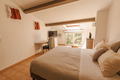 Spacious guest room with country view and pool
