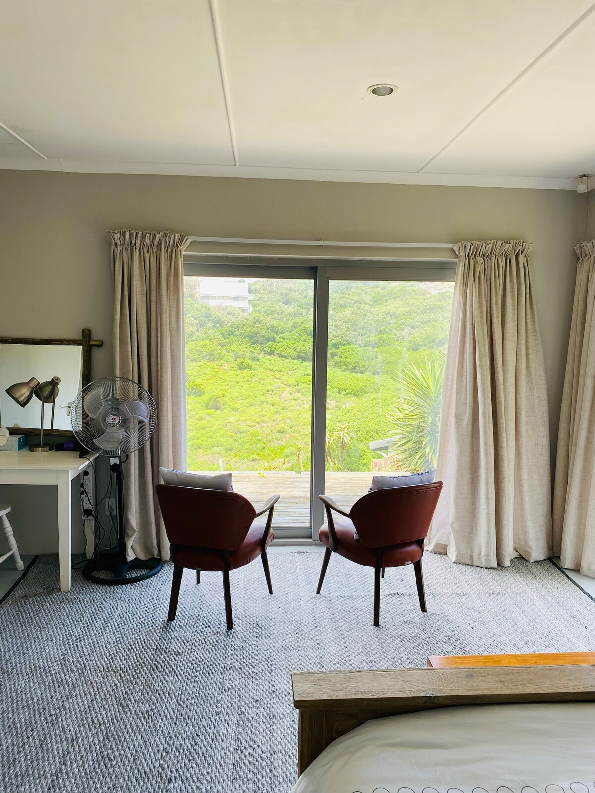 Kick back and relax in this calm, stylish space.