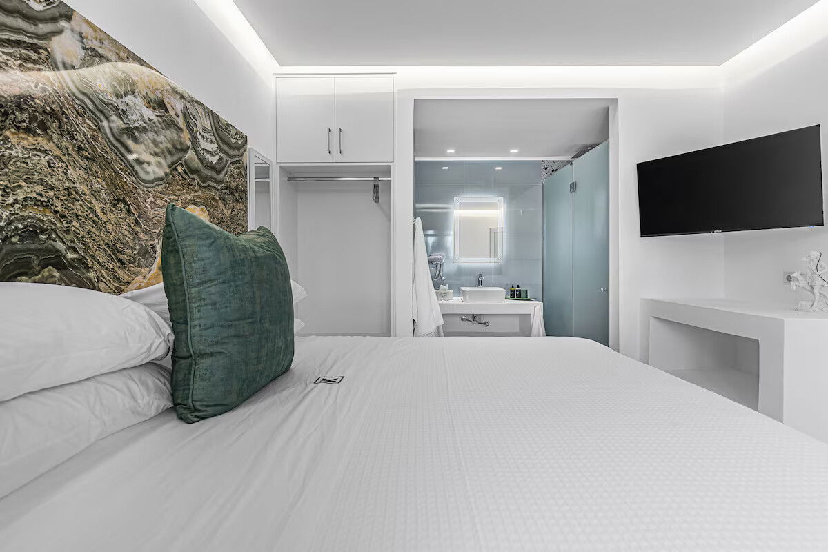 Enjoy garden views and boutique comfort in the Hephaestus Room at Villa K 🌿