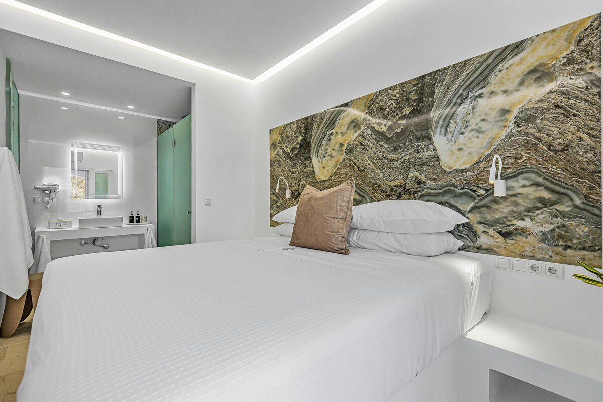 Relax in the comfort of the Apollo room at Villa K Hotel - a stylish double room