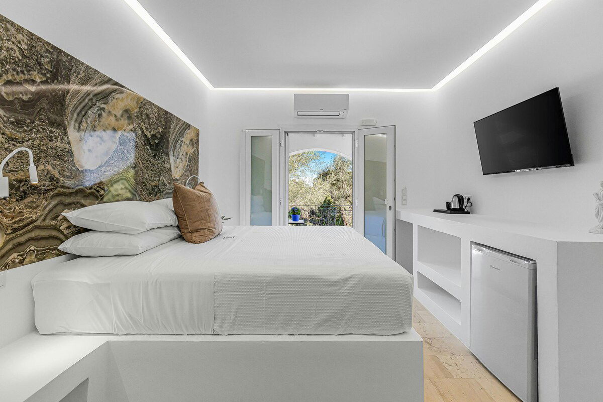 Relax in the comfort of the Apollo room at Villa K Hotel - a stylish double room