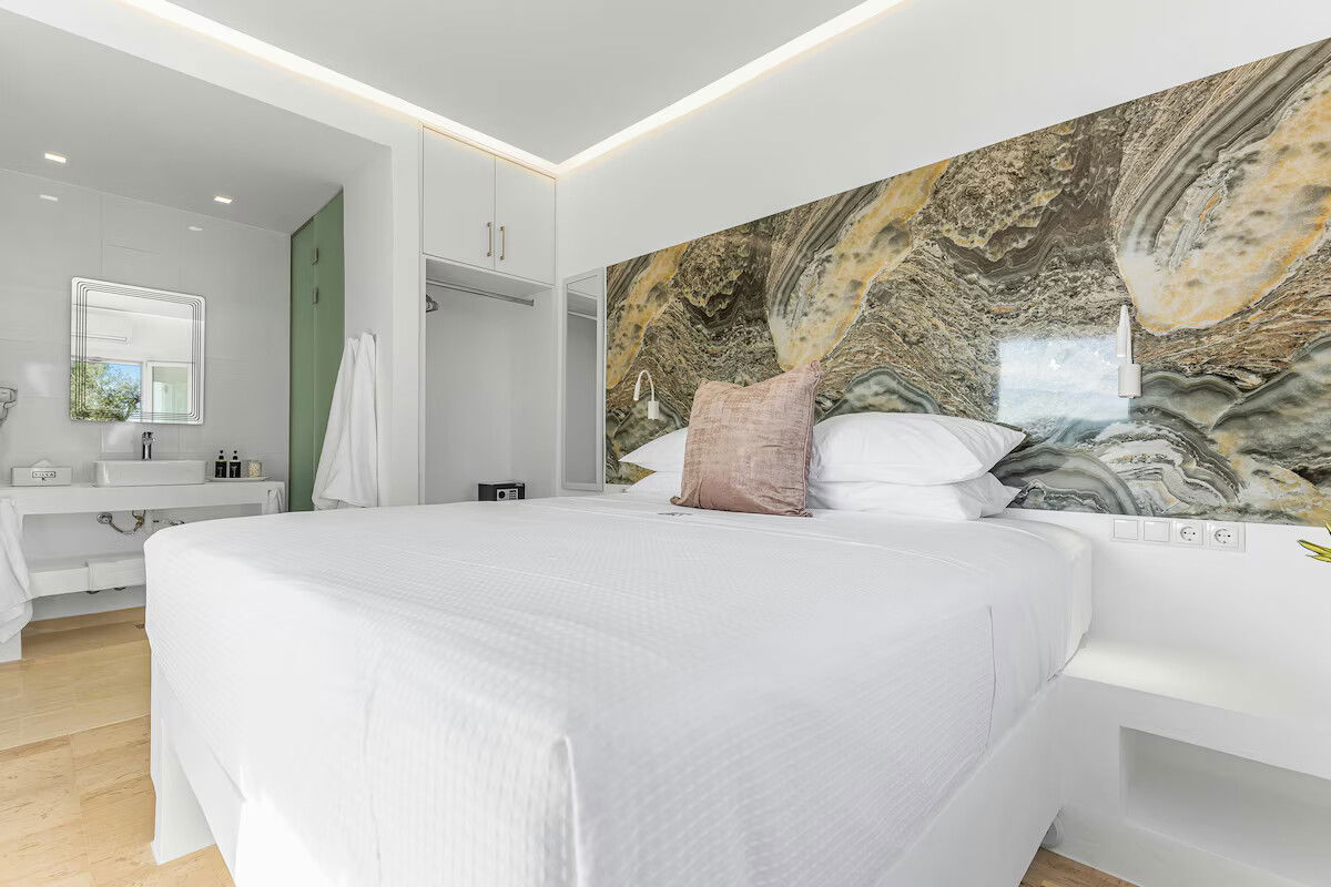 Stay in the Poseidon Room at Villa K Hotel - a serene first-floor double room 🌿