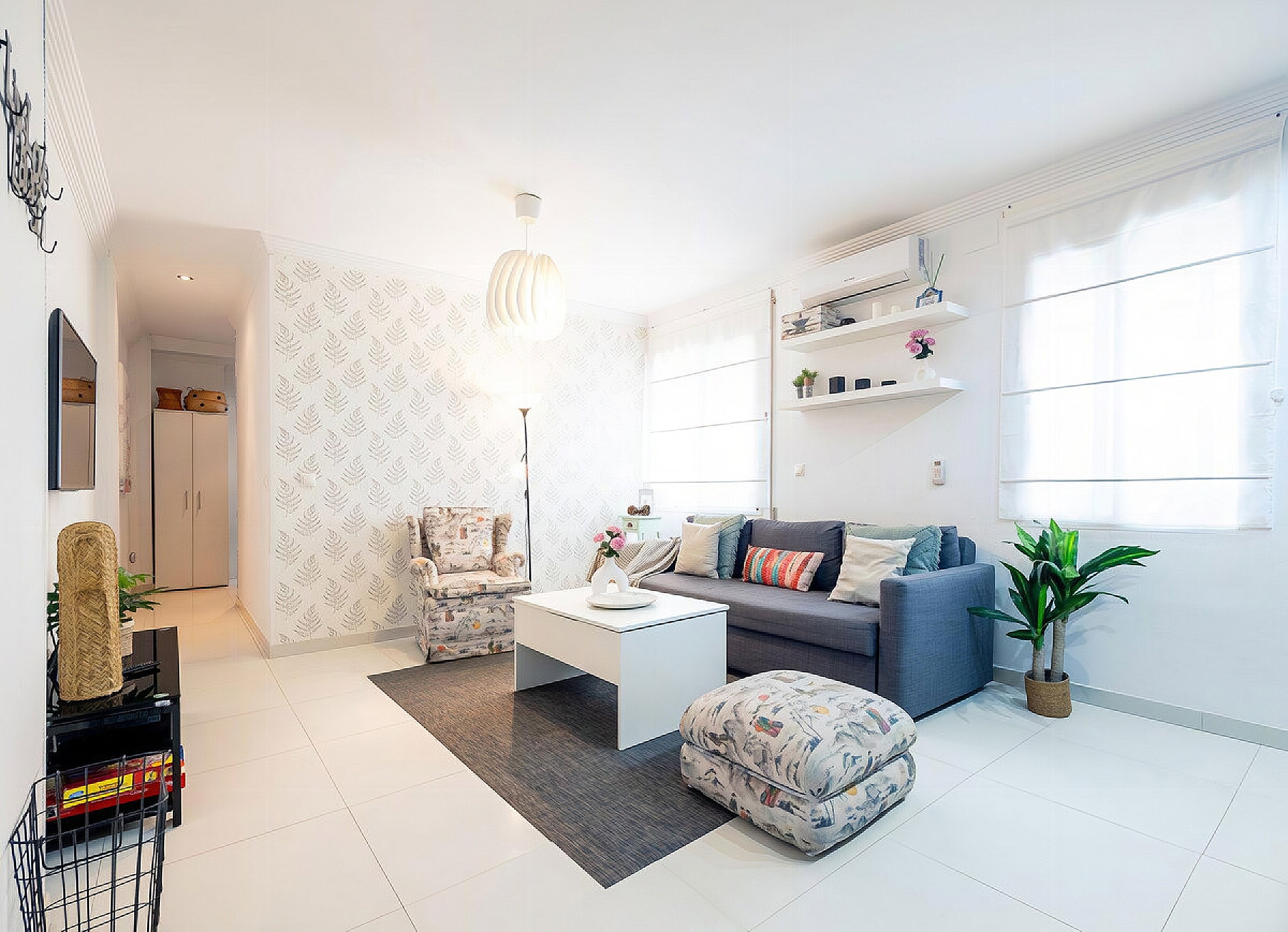 Cozy living room with a soft sofa to relax on.