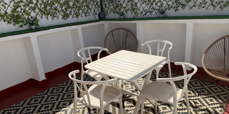 Unwind on the sunny private terrace. Enjoy stylish outdoor dining and relaxing open-air seating in complete tranquility.
